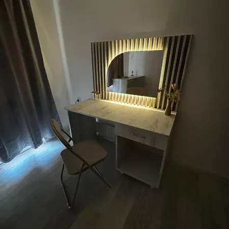 апартаменът у град *