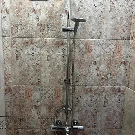 апартаменът у град *