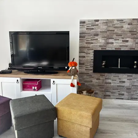 апартаменът у град